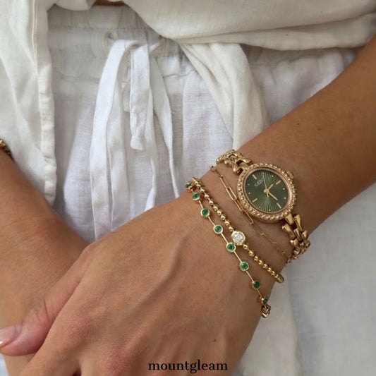 Luxe Shine: Green Oval Dial Watch with Gold Alloy Chain Bracelet