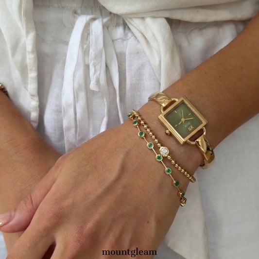 Cuff Chic: Green Square Dial Watch with Gold Cuff Bracelet