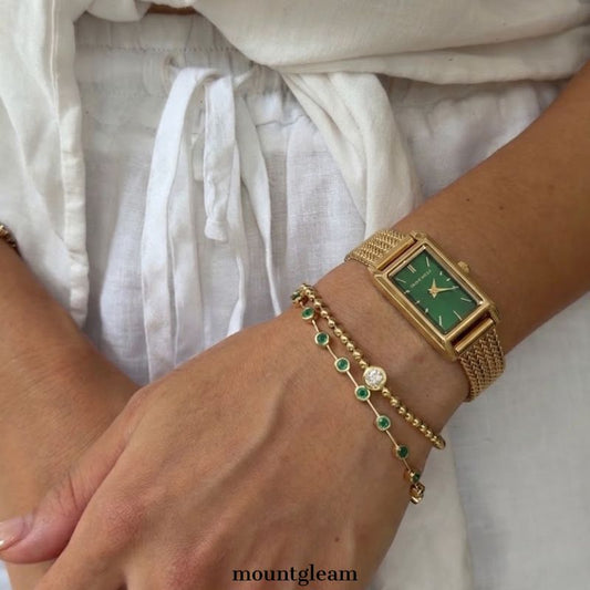 Luxe Natural: Emerald Green Elongated Rectangular Dial Watch with Gold-Tone Stainless Steel Bracelet