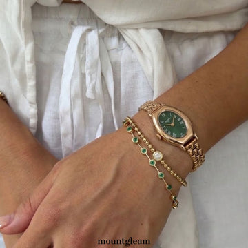 Sophisticated Green Oval Dial Gold-Tone Watch - Classic Vintage Statement for Women