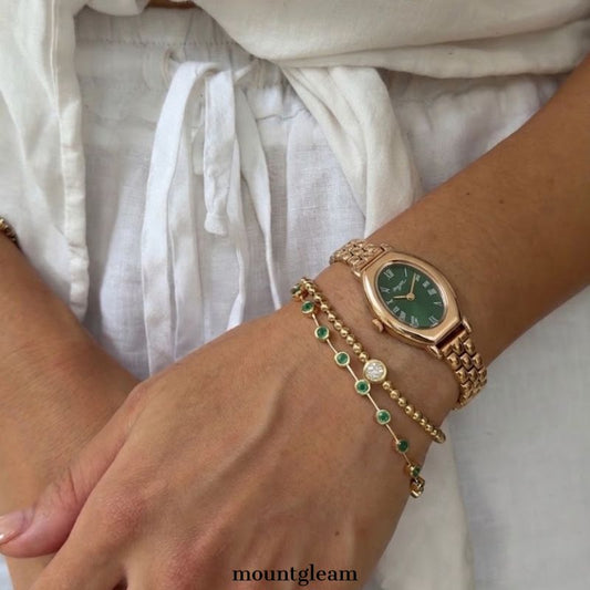 Sophisticated Green Oval Dial Gold-Tone Watch - Classic Vintage Statement for Women