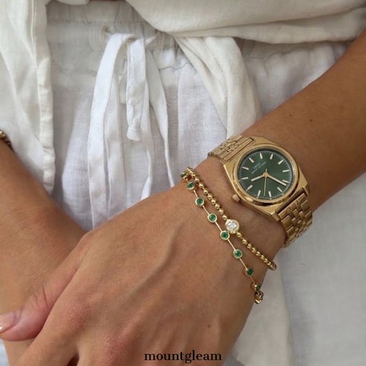 Versatile Charm: Green Round Dial Watch with Gold Stainless Steel Bracelet