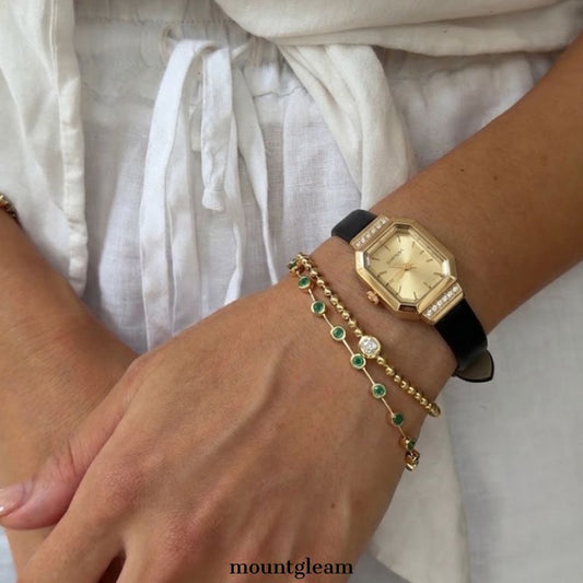 Refined Luxury: Gold Rectangular Dial Watch with Gold Diamond Bezel & Black Leather Strap