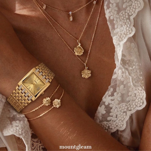 Modern Opulence: Gold Rectangle Dial with Wide Diamond-Set Bracelet