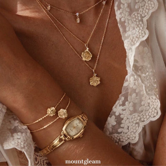 Sophisticated Gold Tonneau Dial Timepiece - Alloy Bracelet Collection
