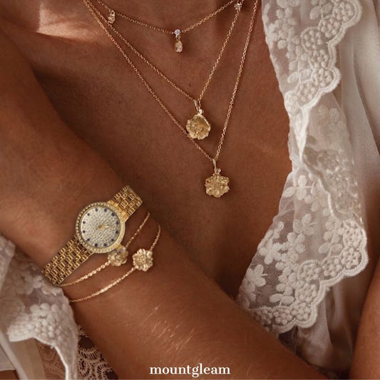 Elegant Diamond-Accented Watch: Round Silver Dial with Micro-Diamonds & Gold-Tone Bracelet