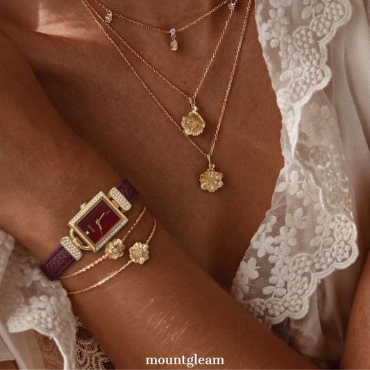 Vintage Charm: A Ruby Red & Gold Gemstone Rectangular Watch