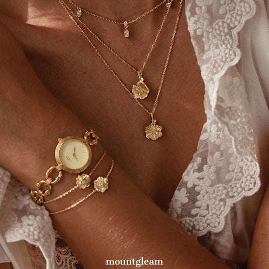 Textured Chic: Gold Round Dial Watch with Gold Denim-Textured Alloy Bracelet