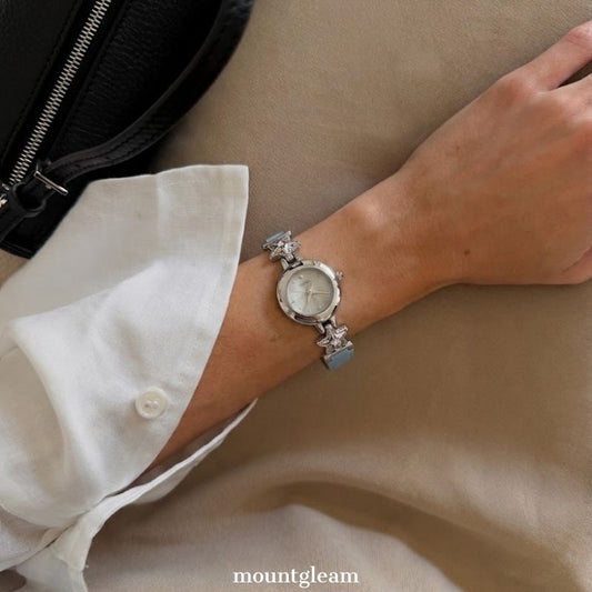 Modern Minimalist: Grey Round Dial Watch with Silver Bezel & Blue Leather Strap