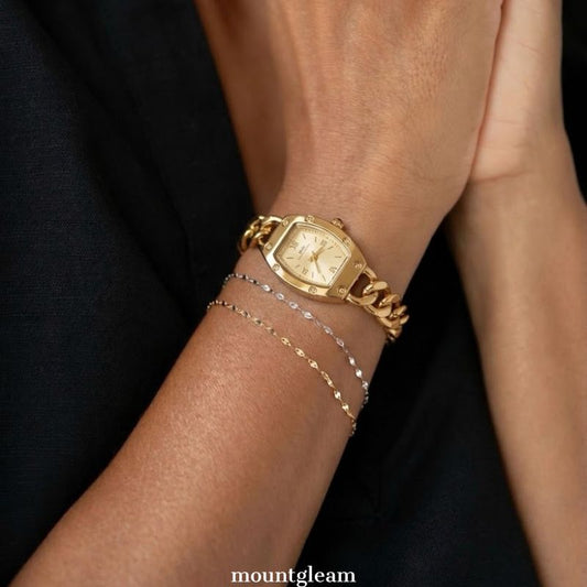 Vintage Curves: Gold Tonneau Dial Watch with Gold Stainless Steel Chain Bracelet