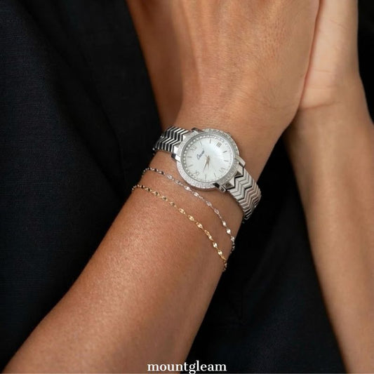 Refined Sparkle: White Diamond Dial with All-Silver Strap