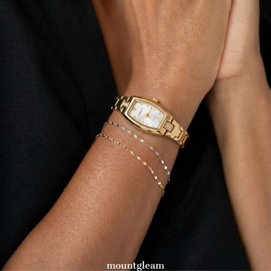 Elegant Contrast:  Barrel Dial with Gold-Tone Bracelet