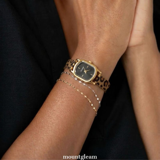 Leopard Edge: Black Oval Dial Watch with Gold Oval Bezel & Brown Leopard Print Steel Bracelet