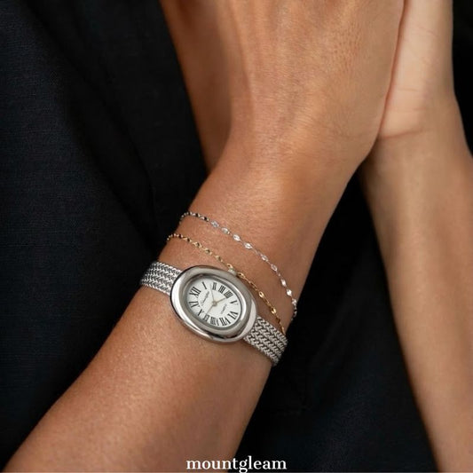 Natural Elegance: White Oval Dial Watch with Silver Wheat Pattern Stainless Steel Bracelet