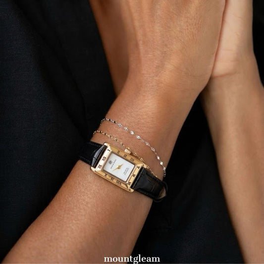 Contemporary Classic: White Rectangular Dial Watch with Gold-Tone Bezel & Black Leather Strap