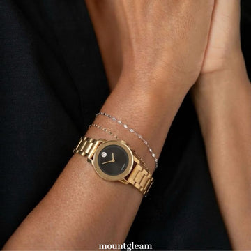 Modern Classic: Black Round Dial with Full Gold-Tone Bracelet