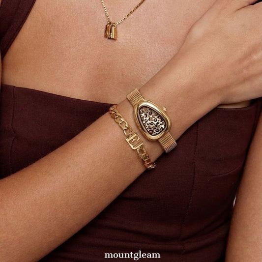 Gouden Serpenti Quartz Watch voor vrouwen - Luipaardprint wijzerplaat & gouden bamboe armband