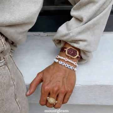 Angora Red Timepiece: Diamond-Shaped Dial Gold Case Quartz Watch