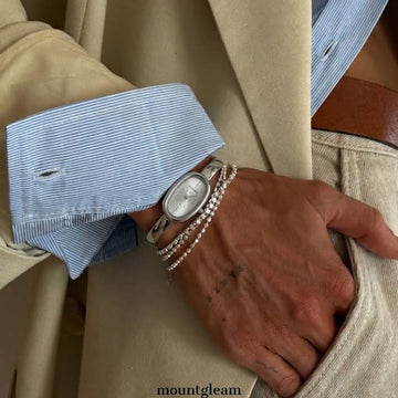 Elegant Simplicity：White Oval Dial Bangle Watch – Silver Oval Case & Silver Stainless Steel Bracelet Quartz