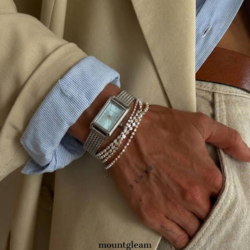 Sophisticated Versatility: Sapphire Blue Elongated Rectangular Dial Watch with Silver Stainless Steel Bracelet