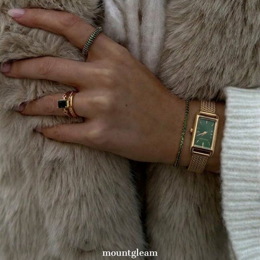 Luxe Natural: Emerald Green Elongated Rectangular Dial Watch with Gold-Tone Stainless Steel Bracelet