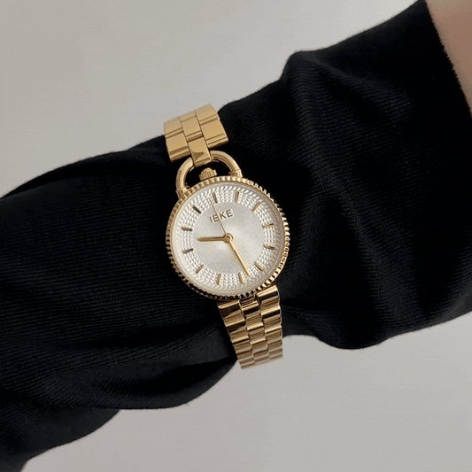 Timeless Elegance: White Round Dial Gold Stainless Steel Quartz Watch