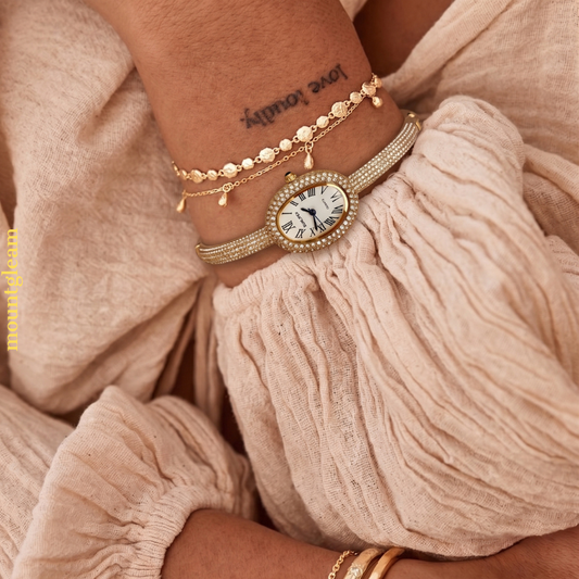 Elegant Diamond‑Studded Gold Bangle Watch – Full Diamond Tonneau Case Women’s Watch