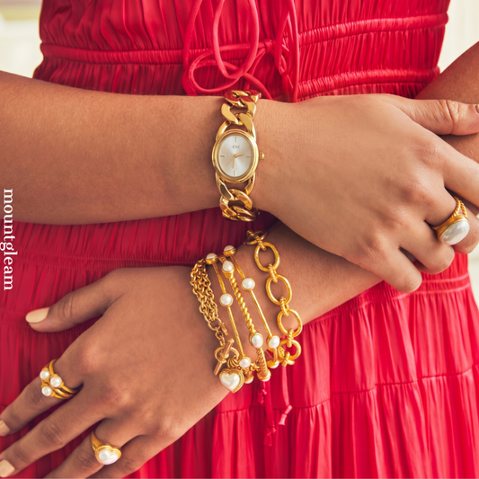 Versatile Chic: White Oval Dial Watch with Gold Bezel & Chain Bracelet