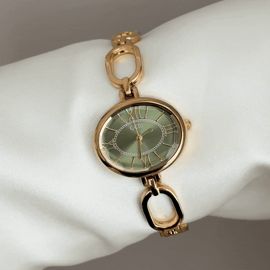 Luxe Shine: Green Oval Dial Watch with Gold Alloy Chain Bracelet
