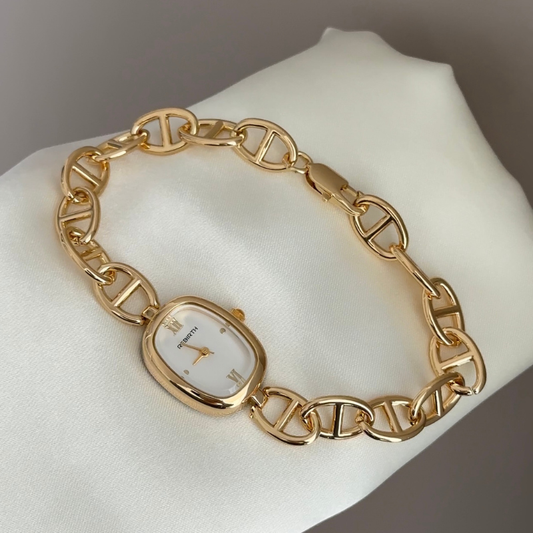 Openwork Art: White Oval Dial Watch with Gold Oval Bezel & Gold Openwork Steel Bracelet