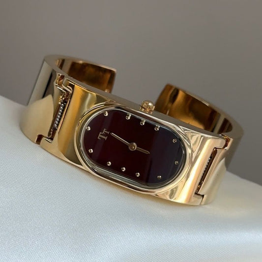 Vintage Polished Gold Wide Cuff Watch with Burgundy Red Oval Dial