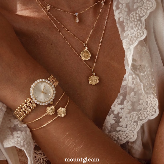 Luxury Elegant: White Round Dial Watch with Gold Gemstone Bezel & Stainless Steel Bracelet