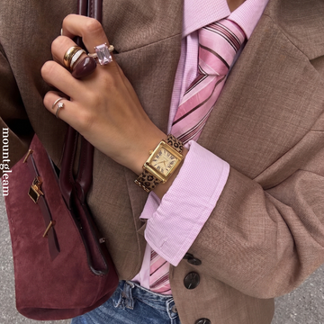 Vintage Glam Timepiece: Leopard Steel Band Gold Watch