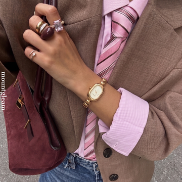 Gold Beaded Bracelet: Gold Case & Oval Dial Women's Quartz Watch