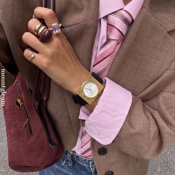 Geometric Fusion: White Round Dial Watch with Gold Rectangular Bezel & Black Silicone Strap