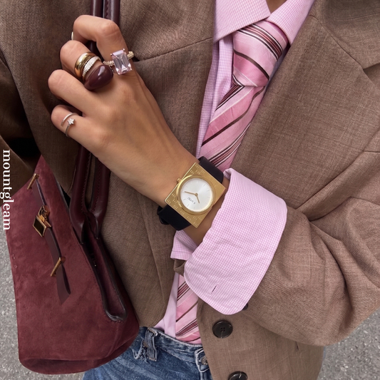 Geometric Fusion: White Round Dial Watch with Gold Rectangular Bezel & Black Silicone Strap