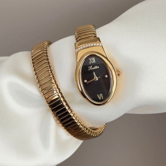 Gilded Shadow: Black Serpent-Head Dial Watch with Gold Bezel & Gold Loop Cuff Bracelet