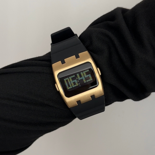 Tech Chic: Black Rectangular Digital Display Watch with Gold Bezel & Black Silicone Strap