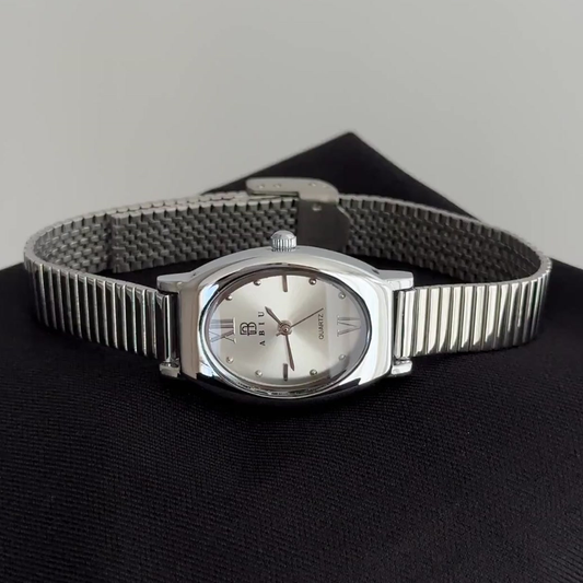 Versatile Elegance: Silver Oval Dial Watch with Silver Bezel & Stainless Steel Bracelet