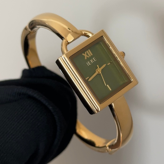 Cuff Chic: Green Square Dial Watch with Gold Cuff Bracelet