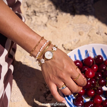 Vintage Floral Charm：White Round Dial Watch with Gold Round Bezel & Gold and White Alloy Floral Link Bracelet
