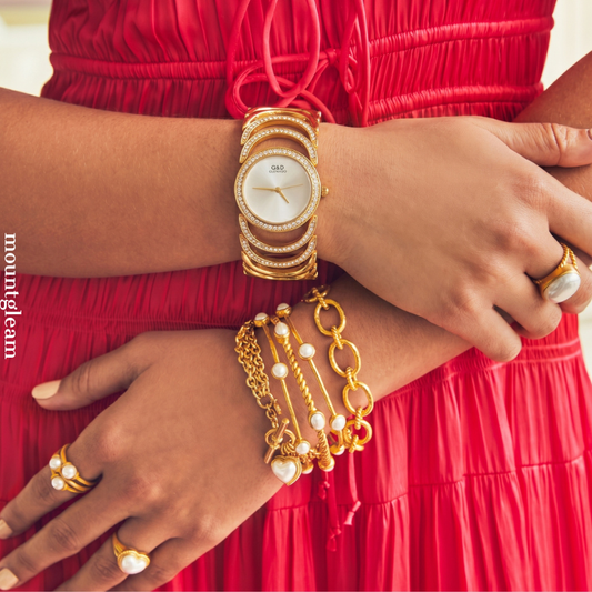 Feminine Refined Elegance: White Diamond Dial Watch with Gold Diamond Bezel & Bracelet