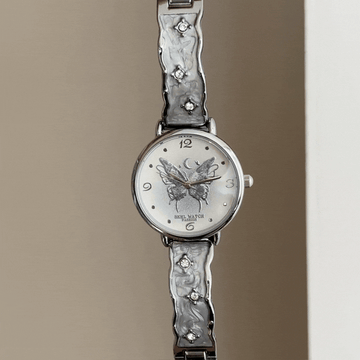 Feminine Charm: White Round Dial Watch with Butterfly Motif & Silver Stainless Steel Bracelet