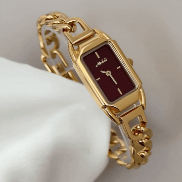 Vintage Glamour: Red Rectangular Dial Watch with Gold Stainless Steel Twisted Rope Bracelet