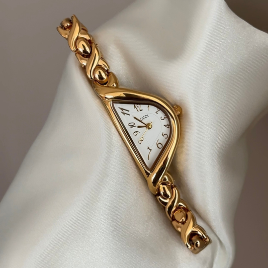 Curved Elegance: White Half-Round Dial & Gold-Tone Bracelet Watch