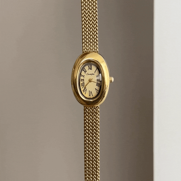 Luxe Texture Luminous: Gold Oval Dial Watch with Gold Wheat-Pattern Stainless Steel Bracelet