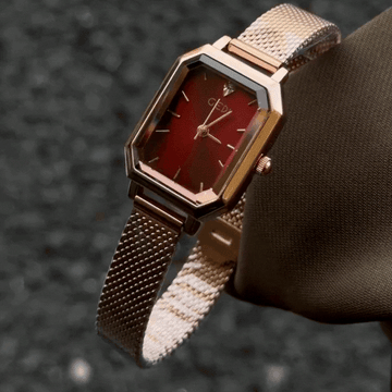 Warm Luxury: Red Rectangular Dial Watch with Rose Gold Bezel & Rose-Tone Stainless Steel Bracelet