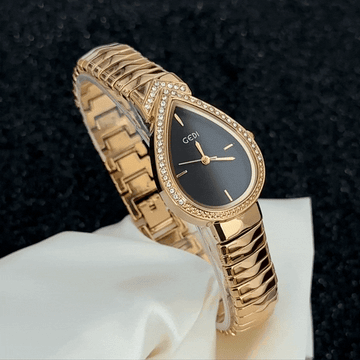 Mysterious Glamour: Black Teardrop Serpenti Dial with Gold Diamond Bezel & Strap