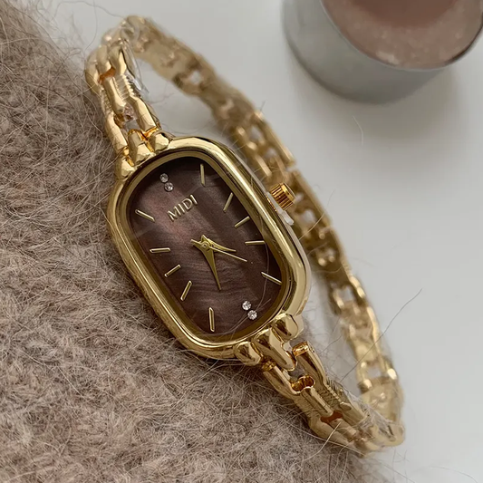 Golden Elegance Timepiece: Oval Coffee Dial Watch