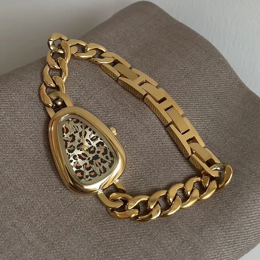 Serpenti Luxe – Gold Bracelet Watch with Leopard Face